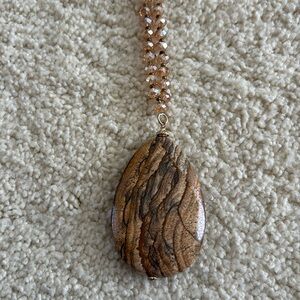 NWOT. Beige Teardrop Shaped Stone Pendant Necklace with Beaded Chain